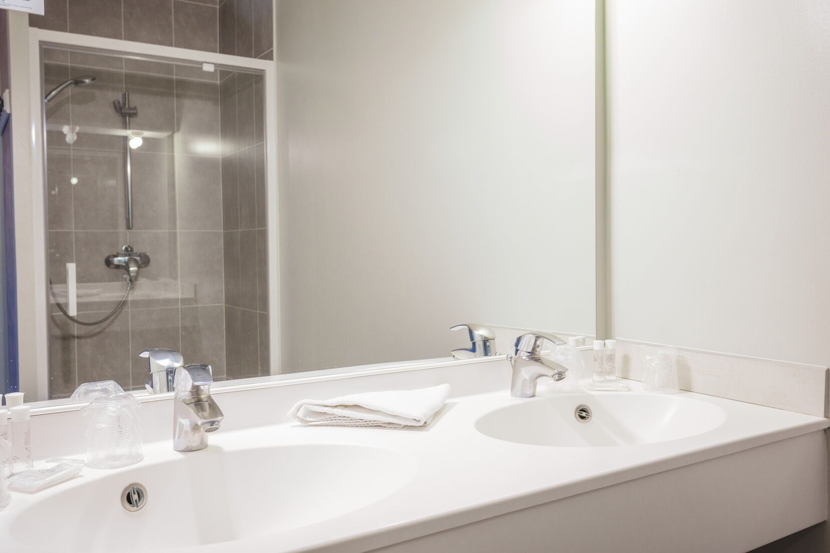 family room | bathroom | shower, free toiletries, hair dryer, towels