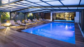 Indoor pool, outdoor pool, open 9:00 AM to 9:00 PM, pool umbrellas