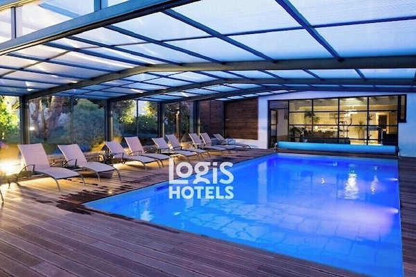 Indoor pool, outdoor pool, open 9:00 AM to 9:00 PM, pool umbrellas
