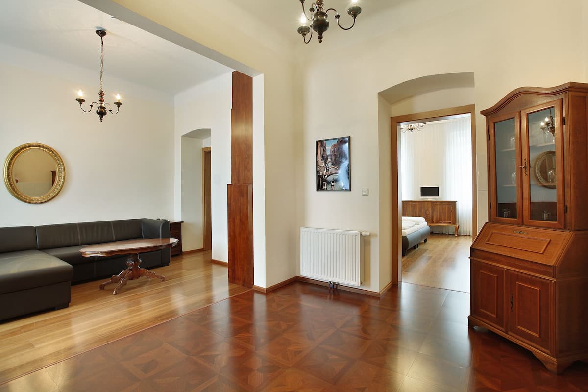 Family Suite, Multiple Bedrooms | Living area | LCD TV