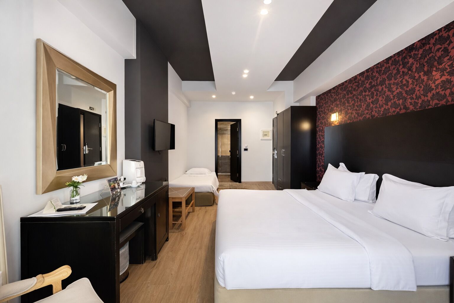 Triple Room | Memory foam beds, desk, blackout drapes, soundproofing