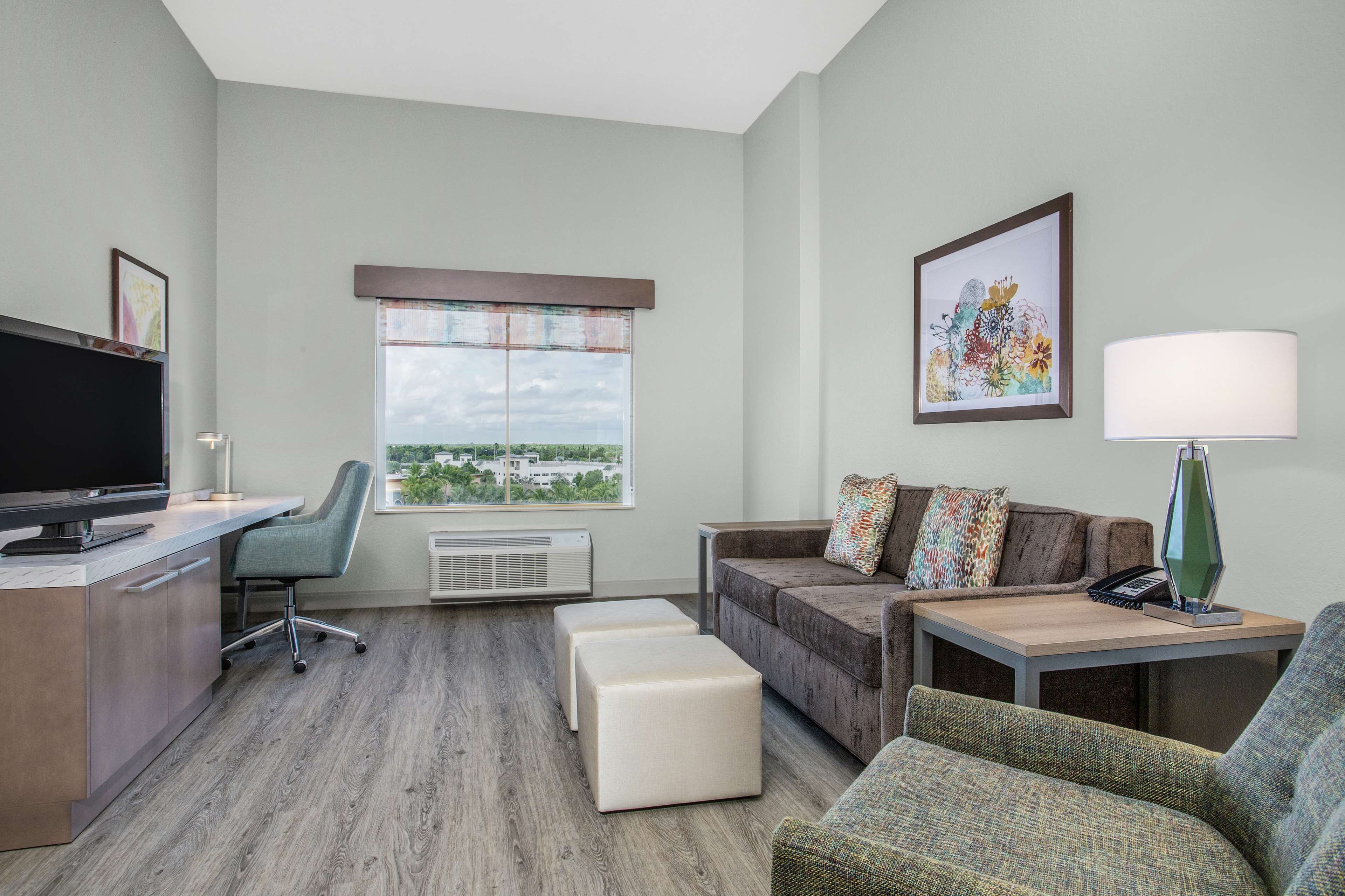 premium bedding, pillow-top beds, desk, blackout curtains