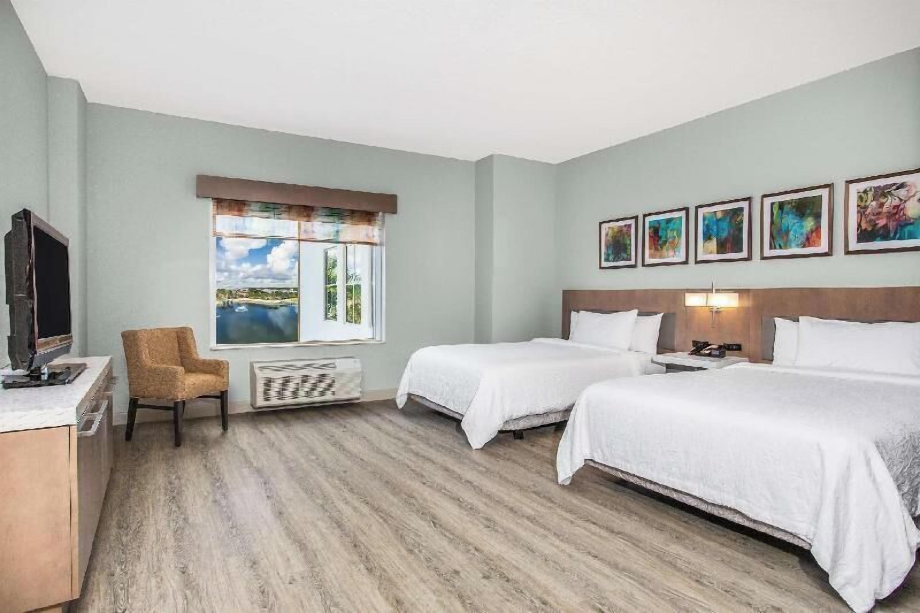 Premium bedding, pillow-top beds, desk, blackout curtains