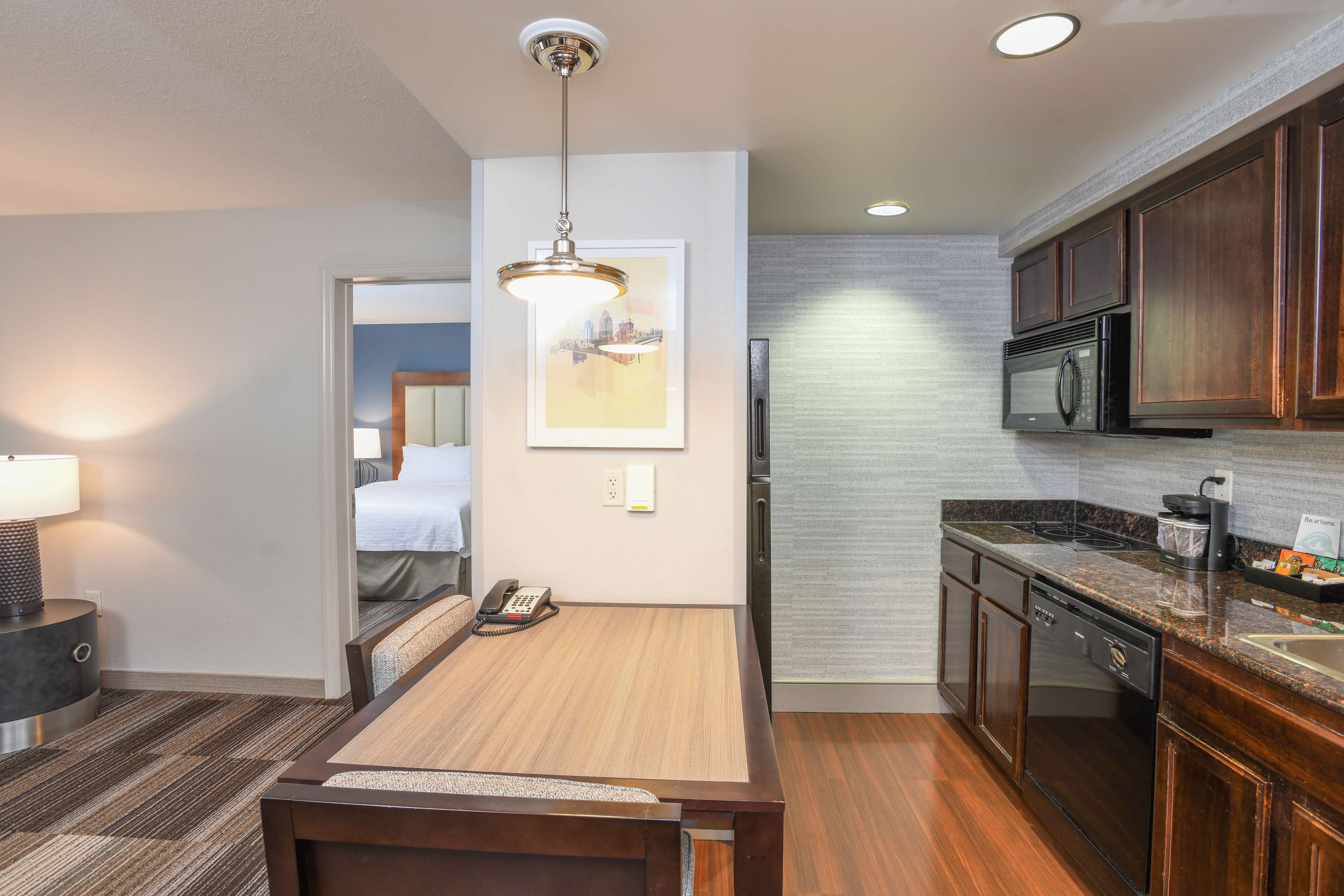 fridge, microwave, coffee/tea maker, cookware/dishes/utensils