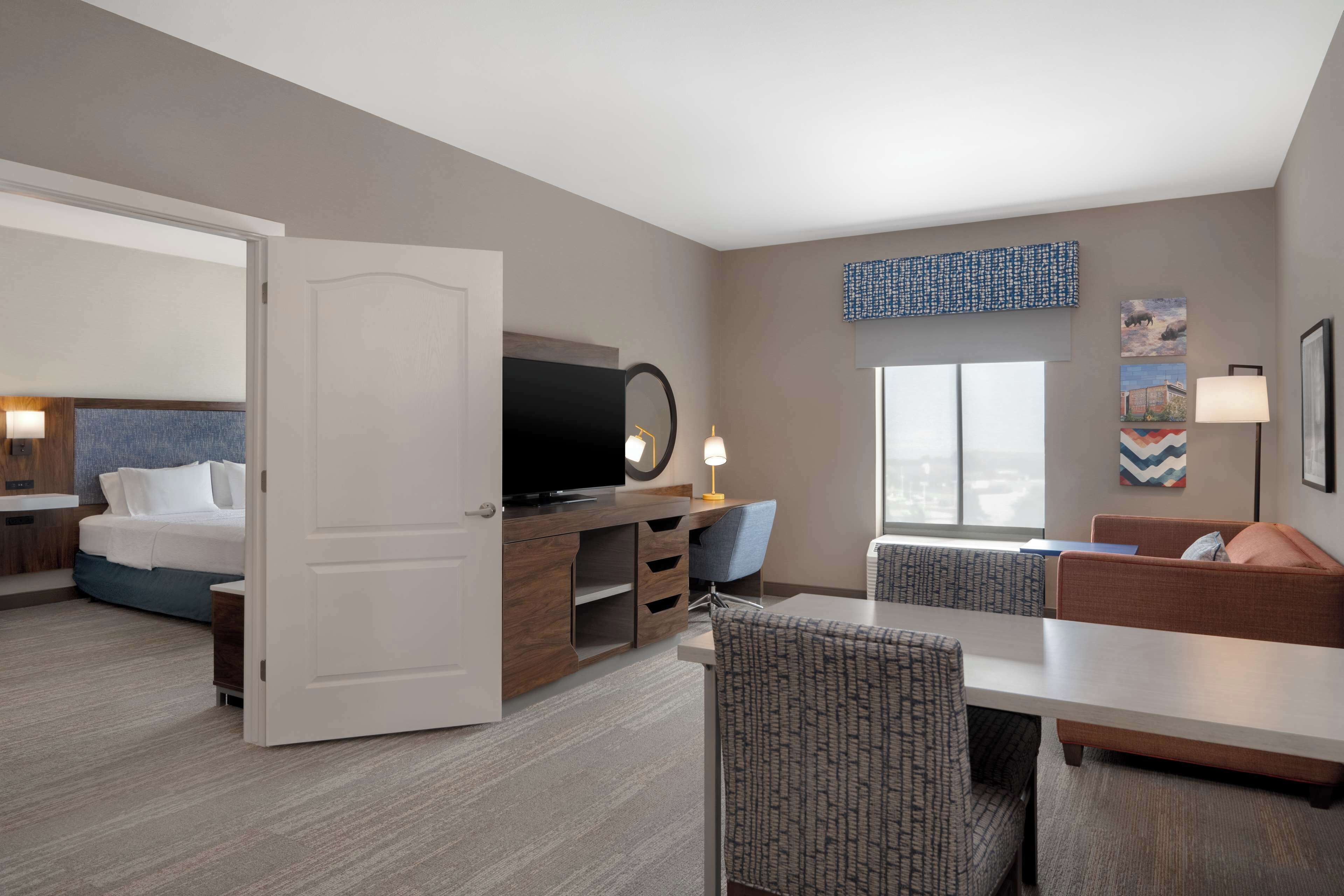 Suite, 1 King Bed, Accessible (Roll-In Shower) | Living area | 55-inch Smart TV with cable channels, TV