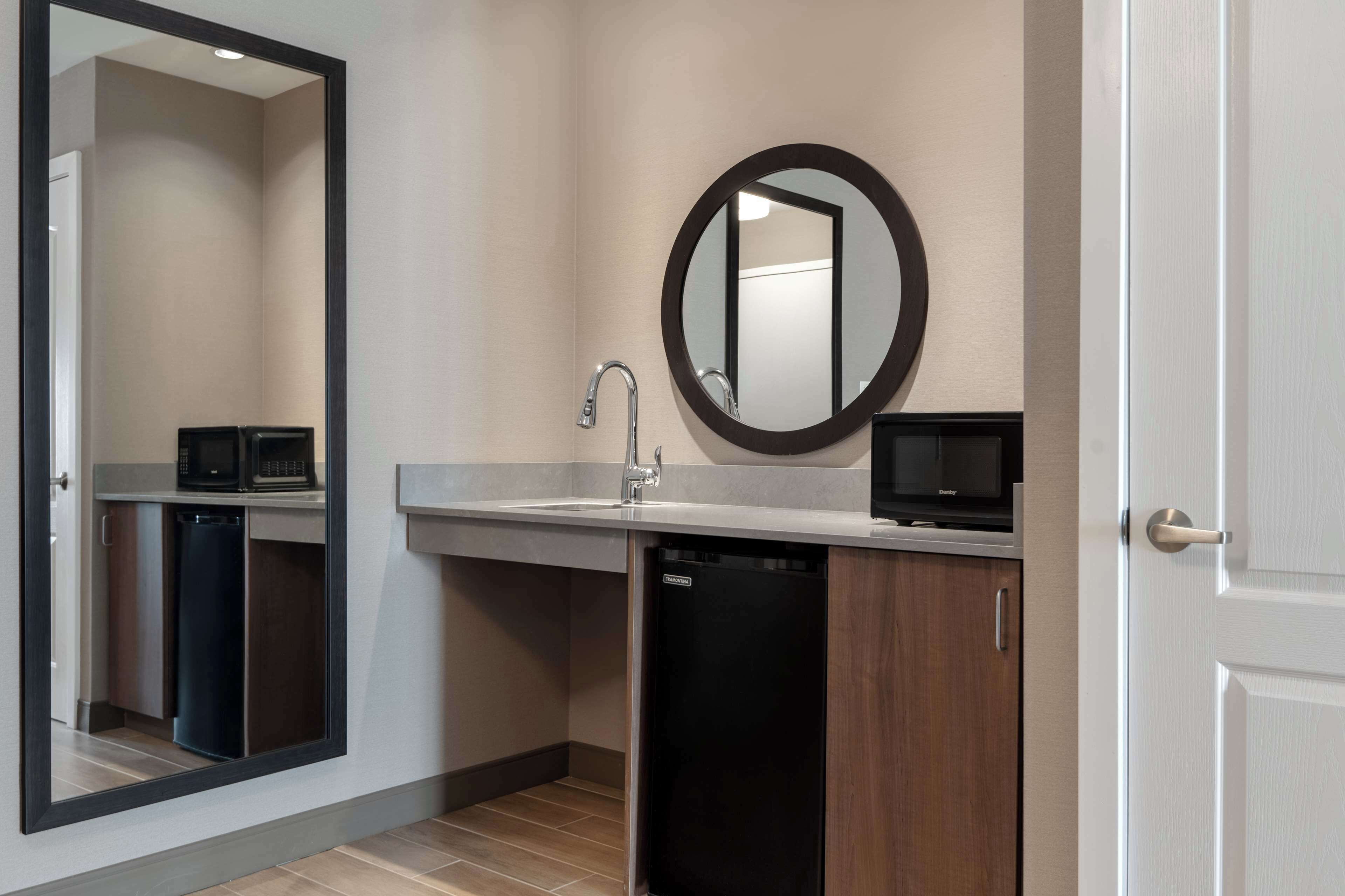 suite, 1 king bed, accessible (roll-in shower) | desk, blackout curtains, iron/ironing board, free cots/infant beds