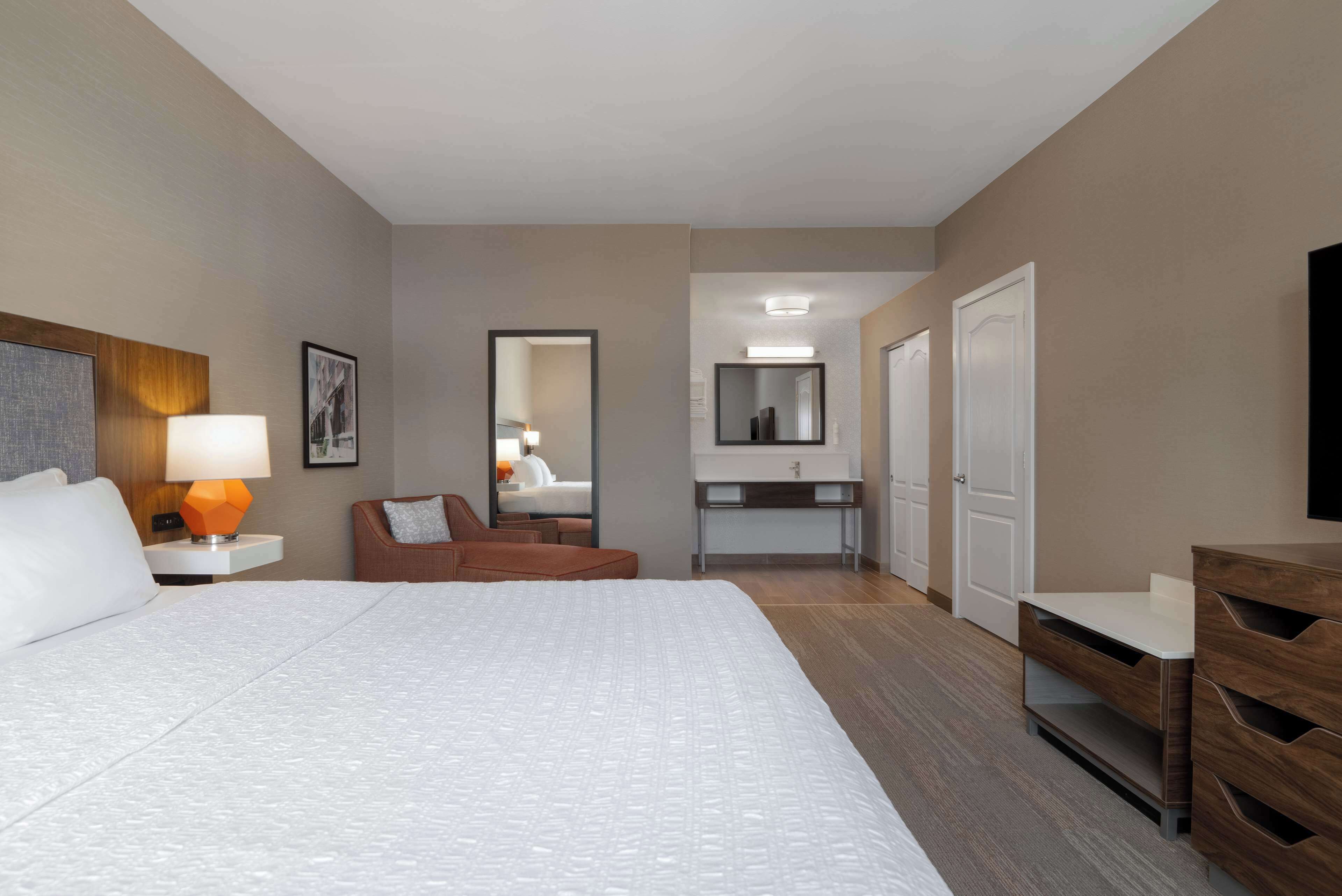 suite, 1 king bed, refrigerator & microwave (wet bar) | desk, blackout curtains, iron/ironing board, free cots/infant beds