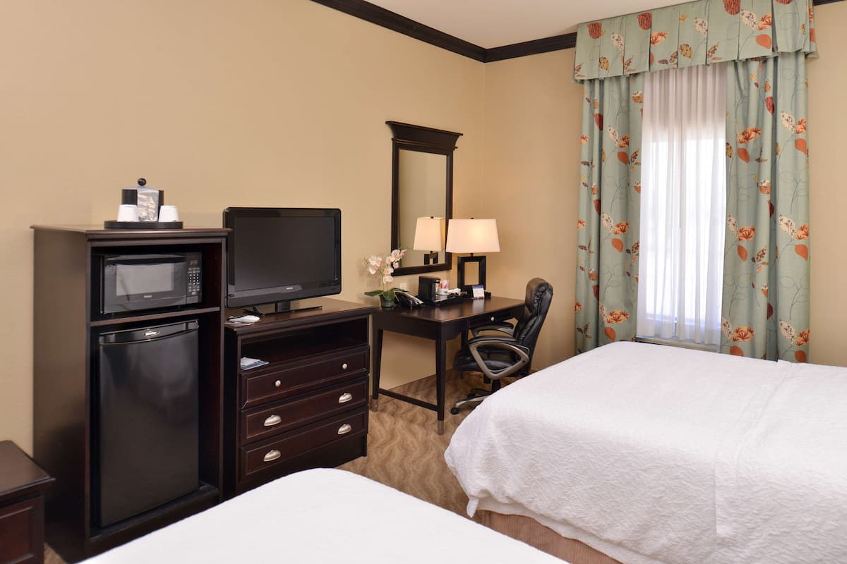 two queen bed | in-room safe, iron/ironing board, free wifi, bed sheets