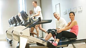 A gym with stationary bikes and treadmills.