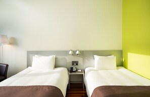 Hypo-allergenic bedding, in-room safe, desk, laptop workspace