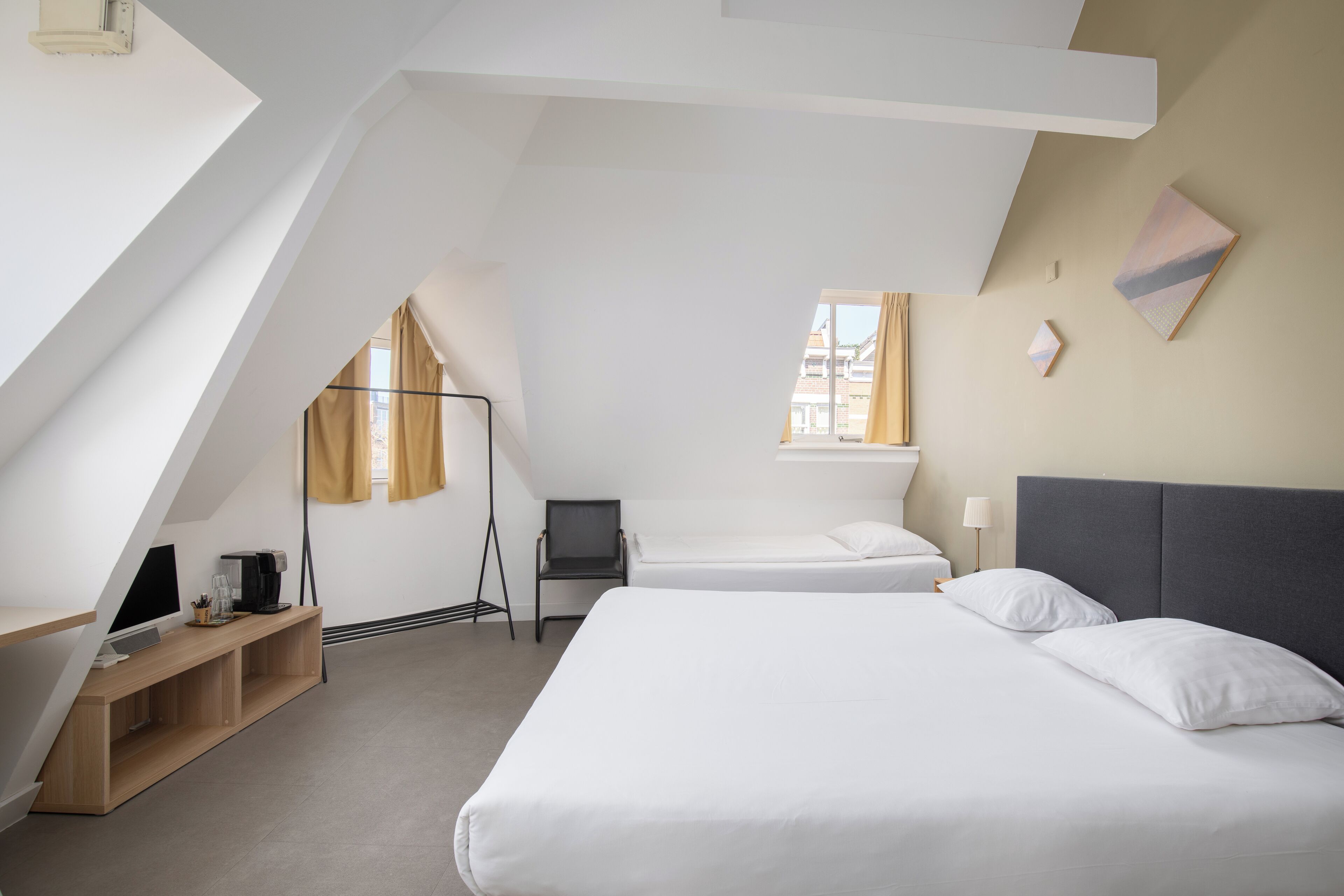 comfort triple room, multiple beds | in-room safe, desk, laptop workspace, blackout curtains