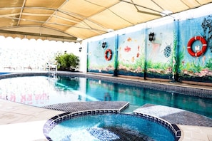 Indoor pool, free pool cabanas, pool umbrellas