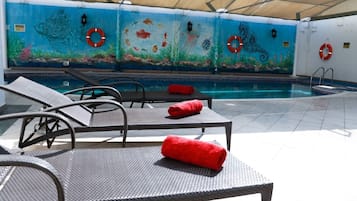 Indoor pool, free pool cabanas, pool umbrellas