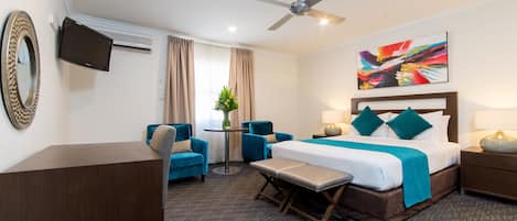 Superior Queen Room | 1 bedroom, desk, blackout drapes, iron/ironing board