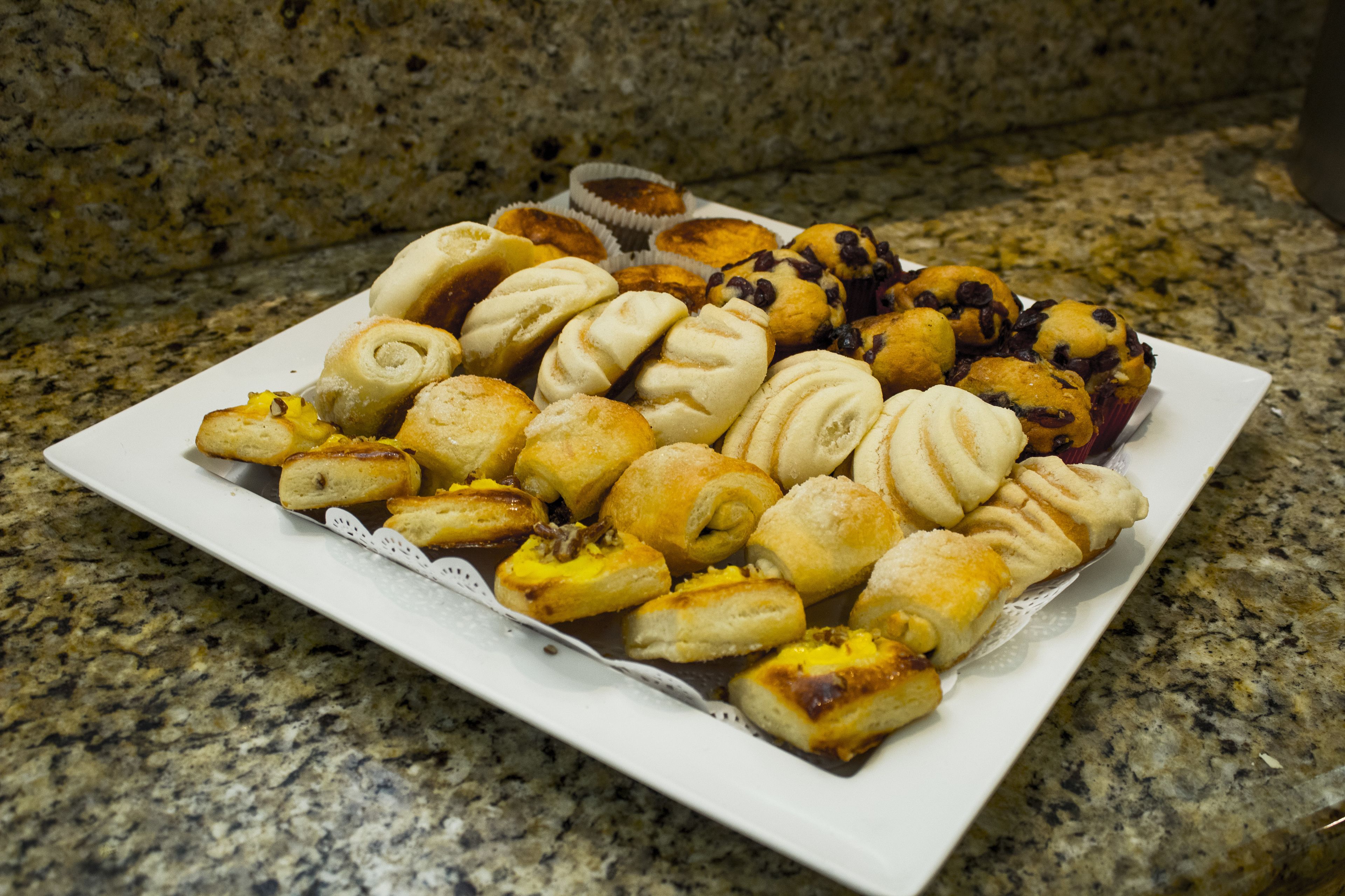 A variety of pastries on a white plate.