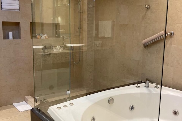 Luxury Suite, 1 Bedroom, Private Bathroom (Master) | Bathroom | Free toiletries, hair dryer, towels, soap