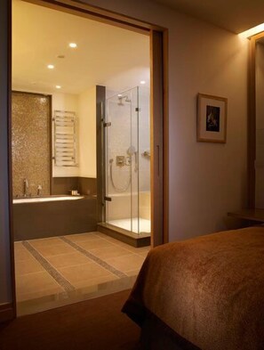 Designer toiletries, hair dryer, bathrobes, towels
