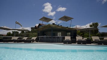 Indoor pool, outdoor pool, pool umbrellas, pool loungers