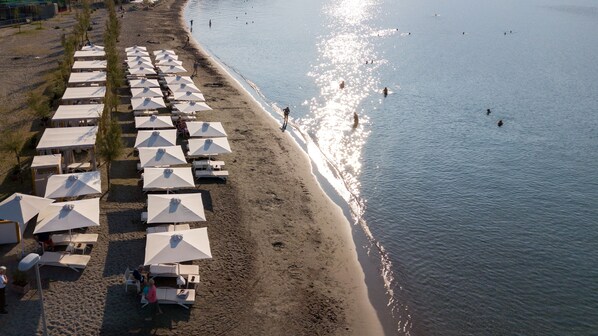 On the beach, free beach cabanas, sun loungers, beach umbrellas