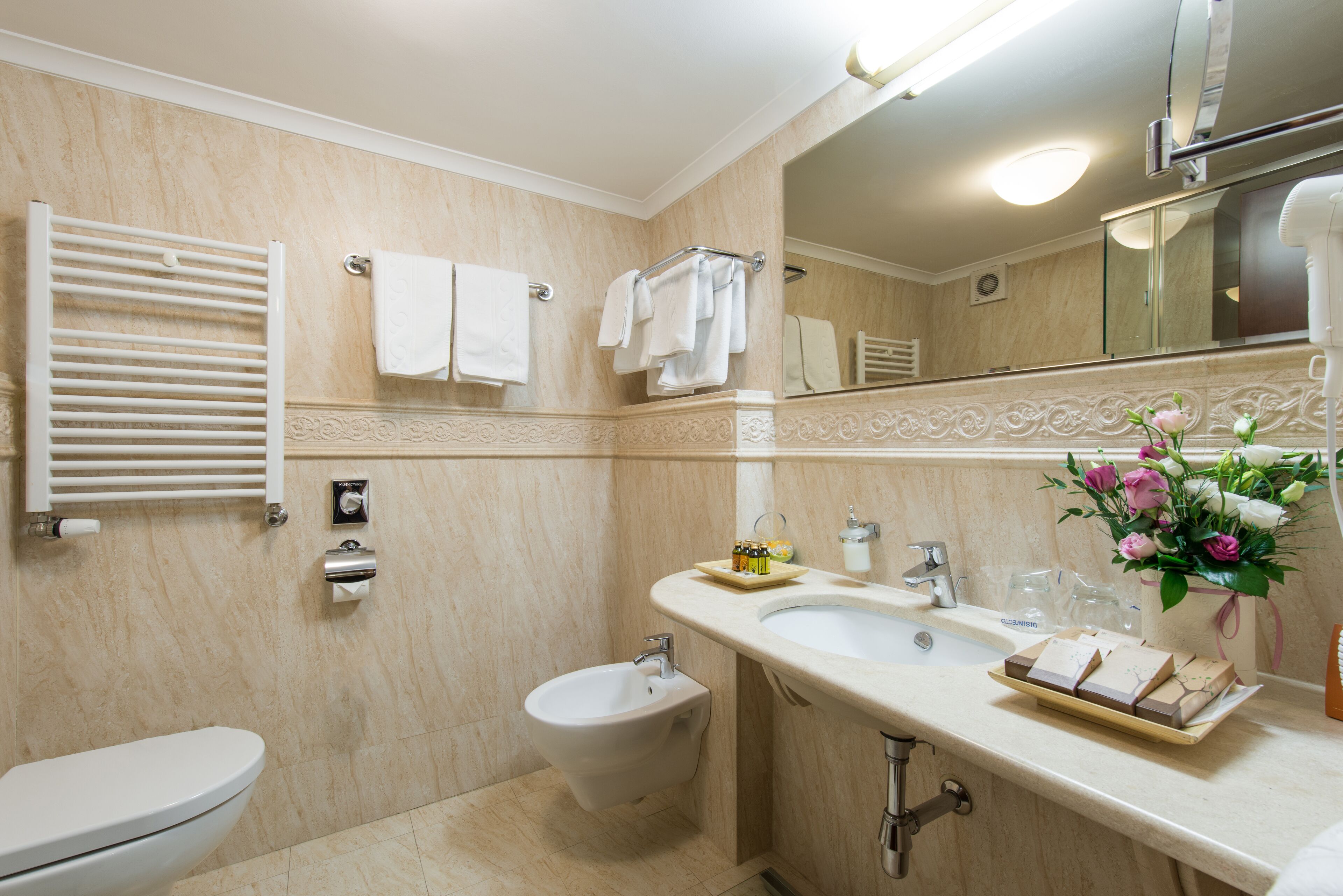 jetted bath, designer toiletries, hair dryer, bathrobes