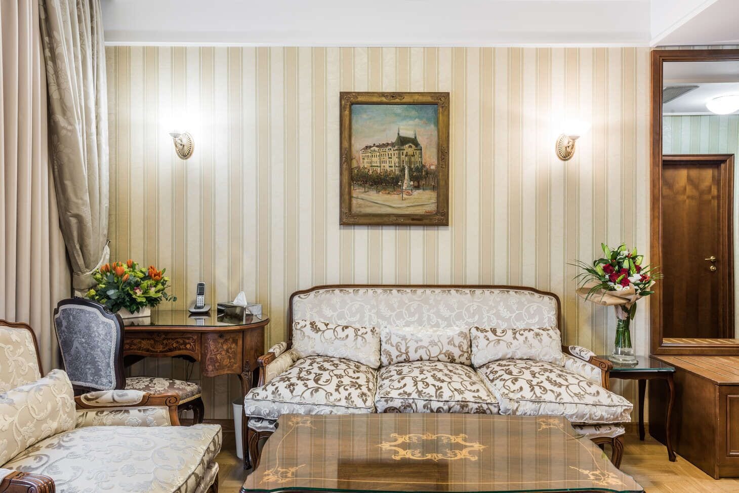 junior suite with free spa access | living area | lcd tv