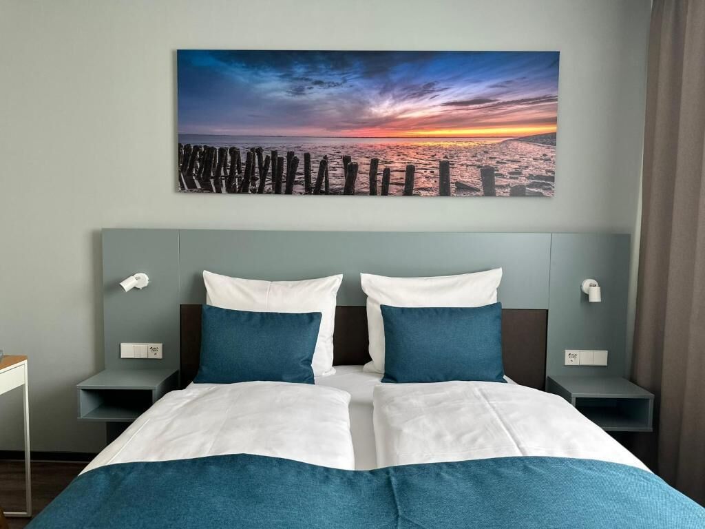 Premium bedding, in-room safe, laptop workspace, soundproofing