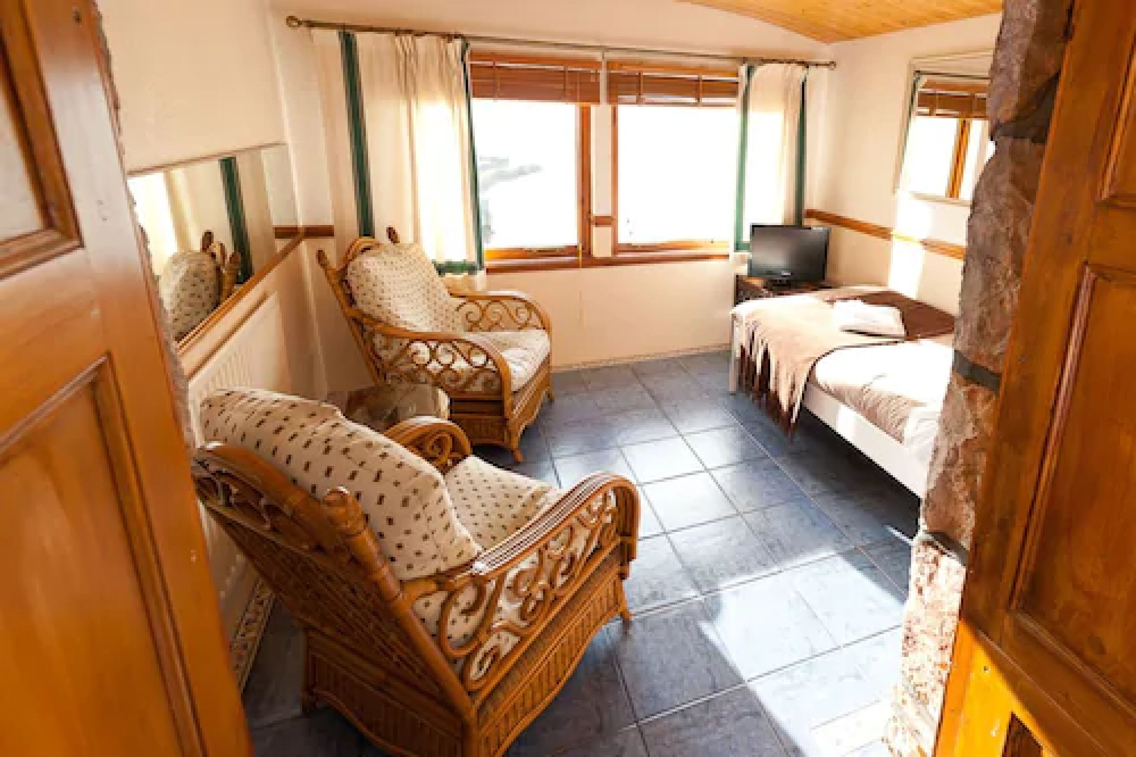 family room - sleep 3 | individually decorated, individually furnished, iron/ironing board