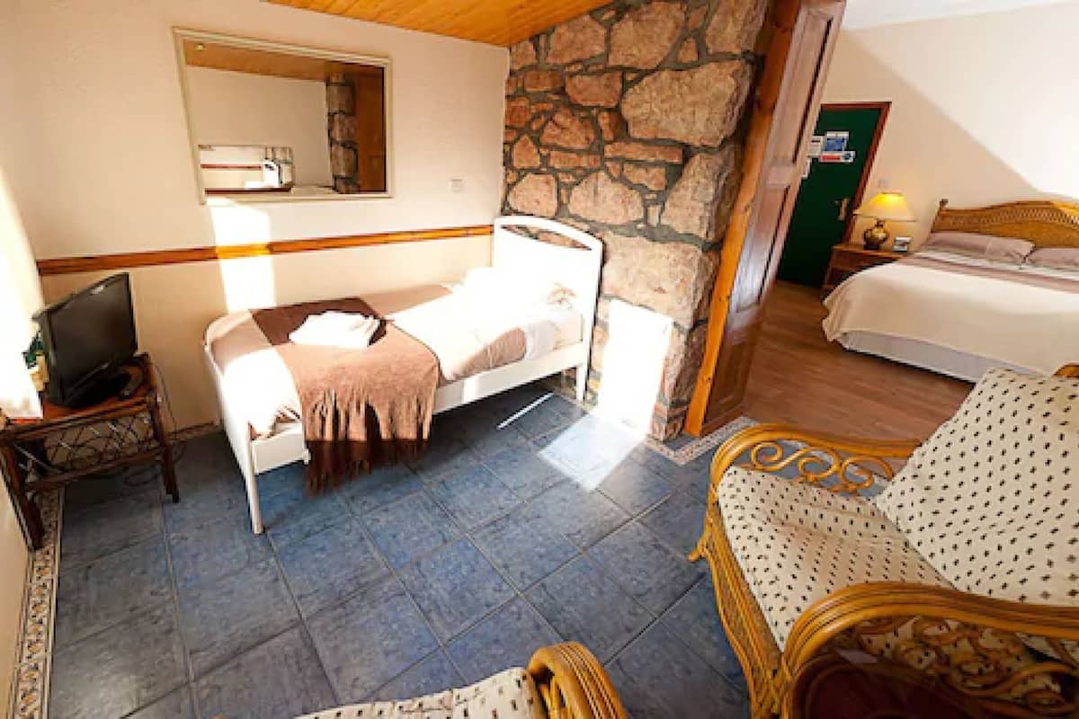 family room - sleep 3 | individually decorated, individually furnished, iron/ironing board