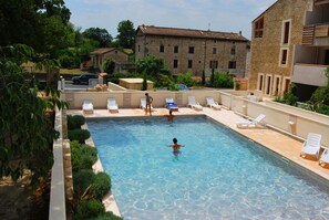 Seasonal outdoor pool, pool loungers