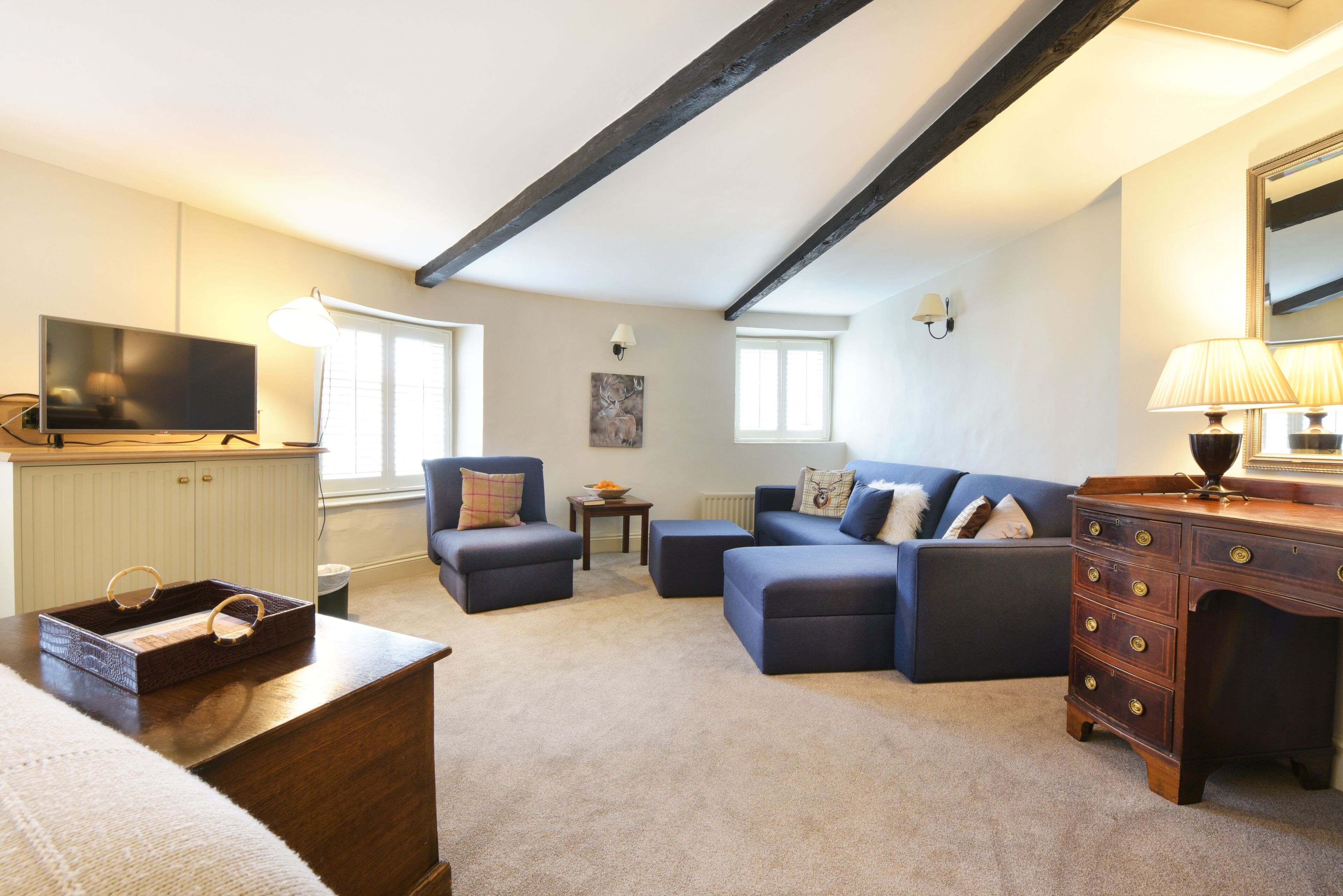 superior family room | individually decorated, individually furnished, desk, blackout curtains