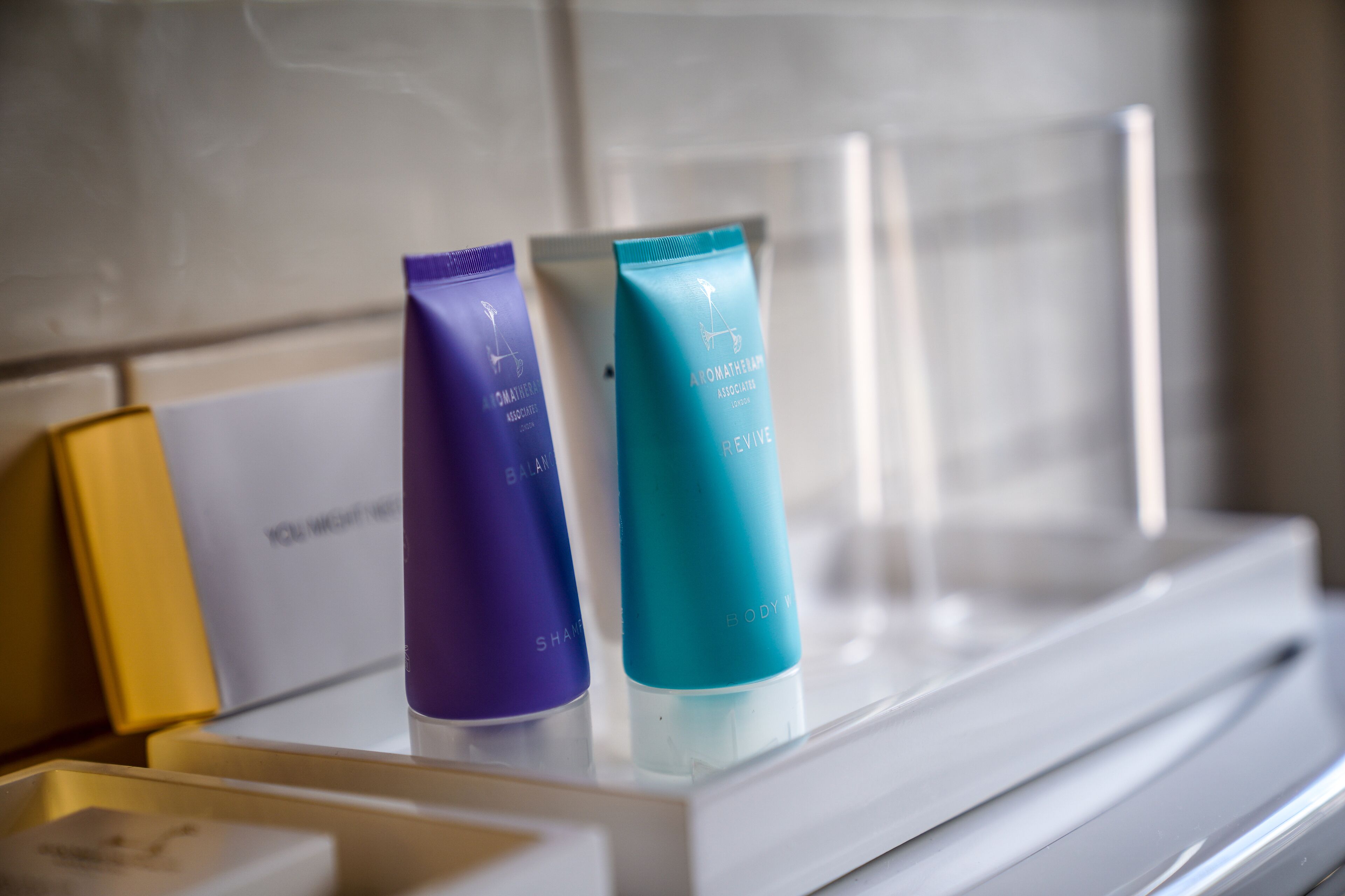 Two skincare products on a counter.