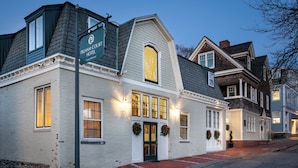 A traditional hotel with a white facade, a dark roof, and a sign indicating it is the Pelham Court Hotel. - Pelham Court Hotel (Newport)