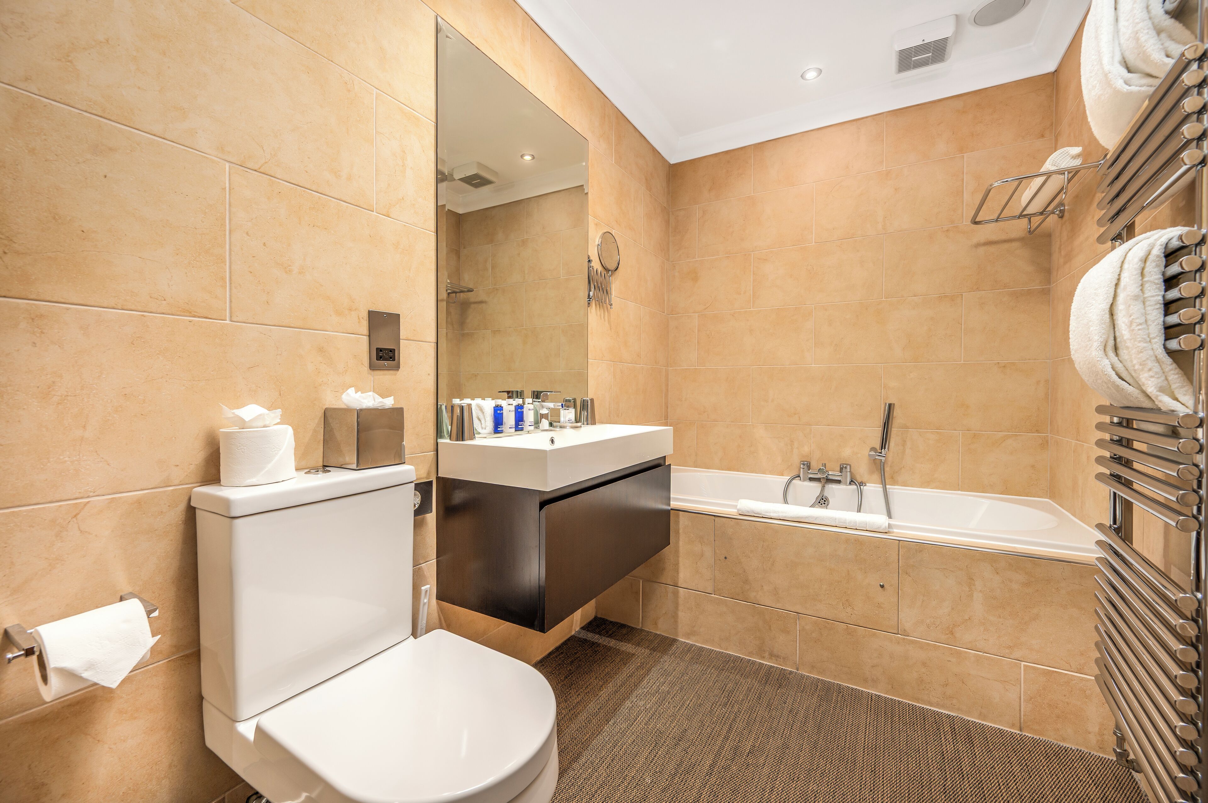 hip | bathroom | separate bathtub and shower, deep-soaking bathtub, rainfall showerhead