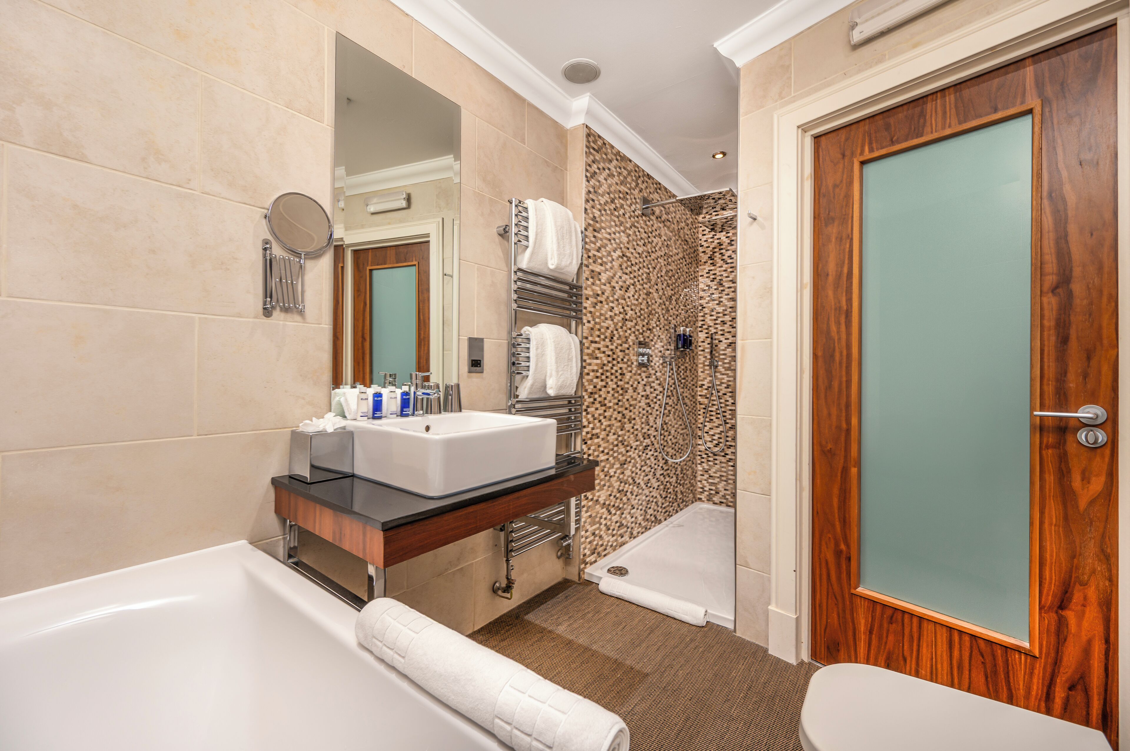 hip | bathroom | separate bathtub and shower, deep-soaking bathtub, rainfall showerhead
