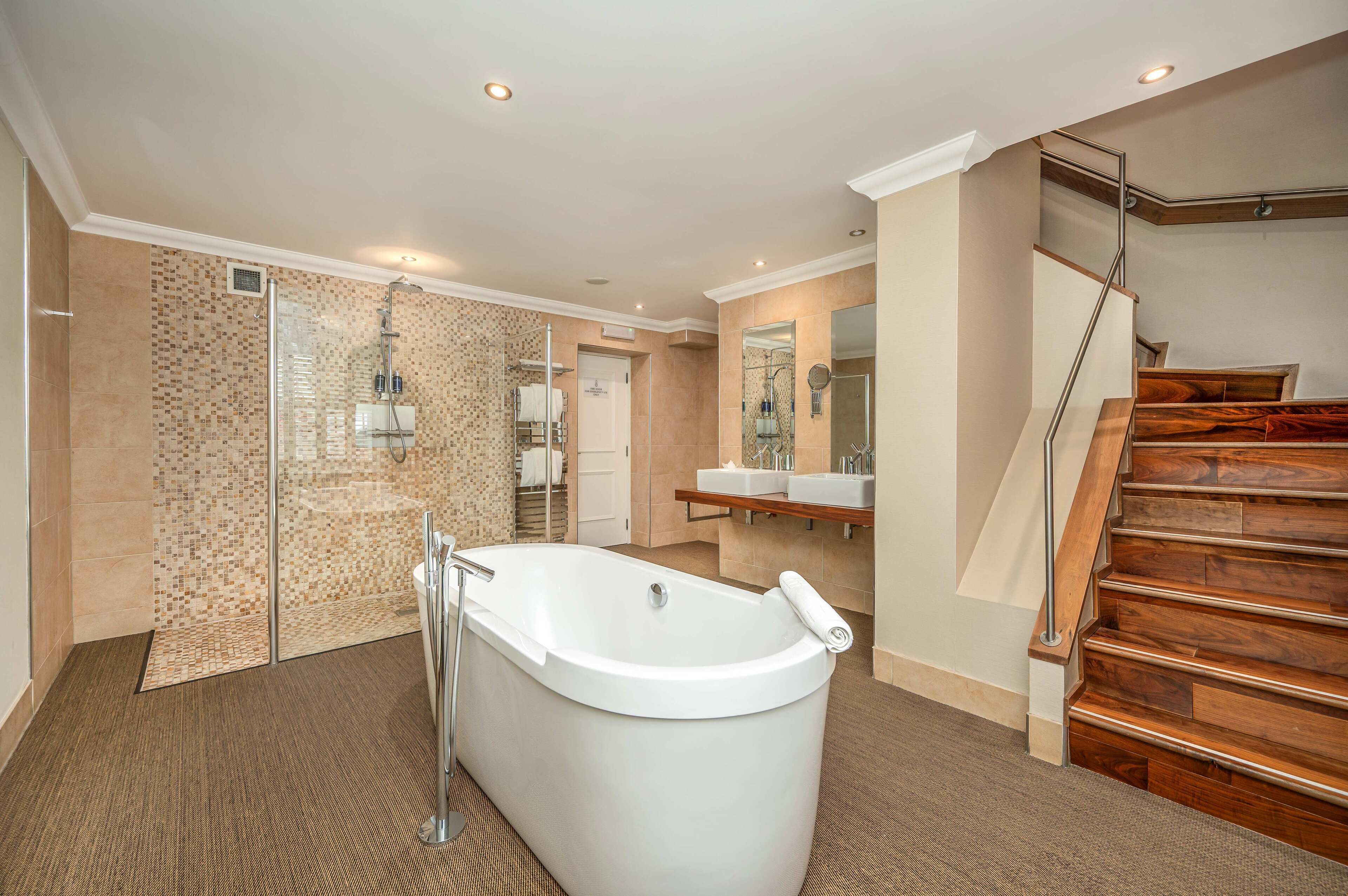 decadent | bathroom | separate bathtub and shower, deep-soaking bathtub, rainfall showerhead