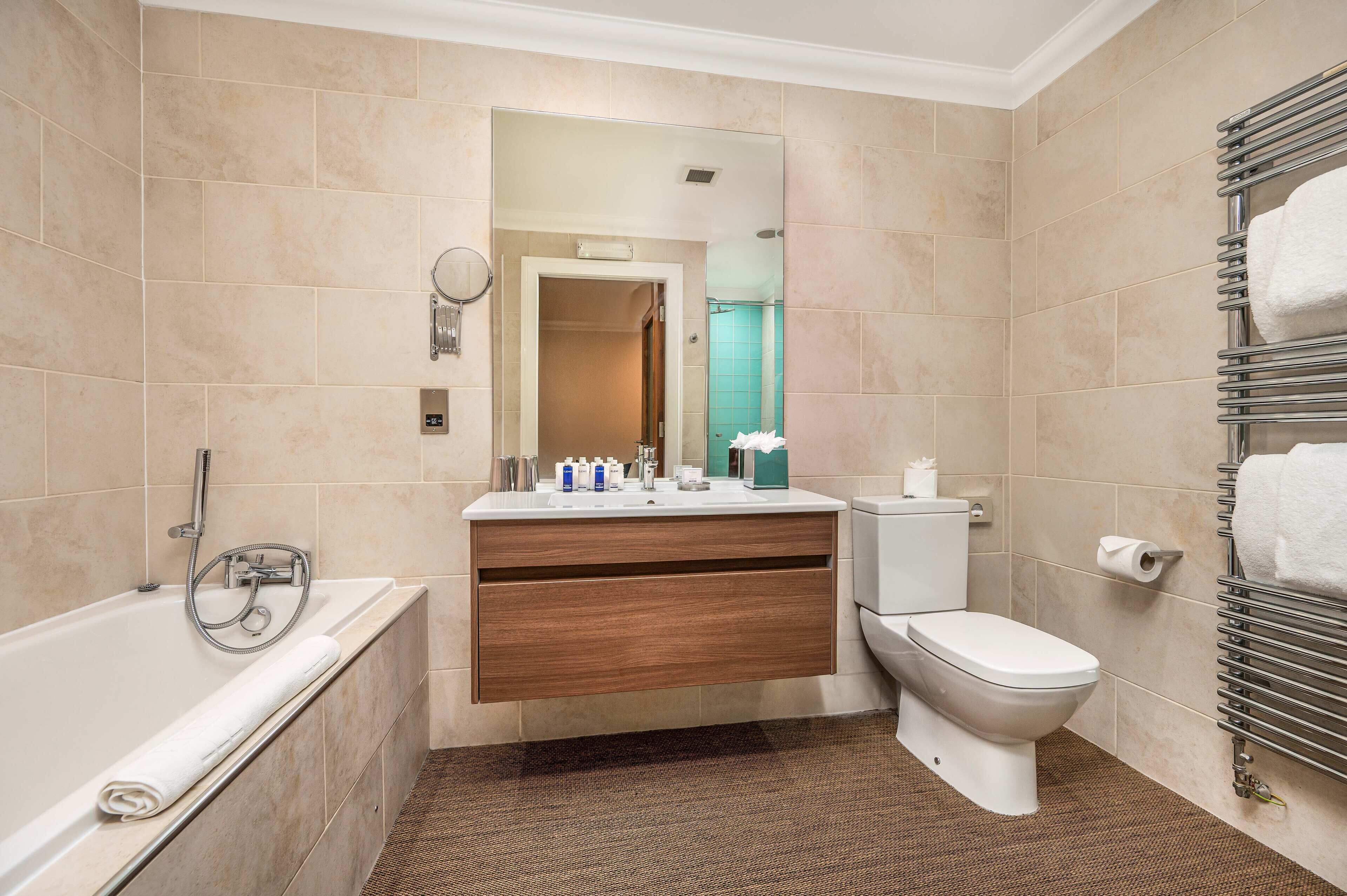 chic | bathroom | separate bathtub and shower, deep-soaking bathtub, rainfall showerhead