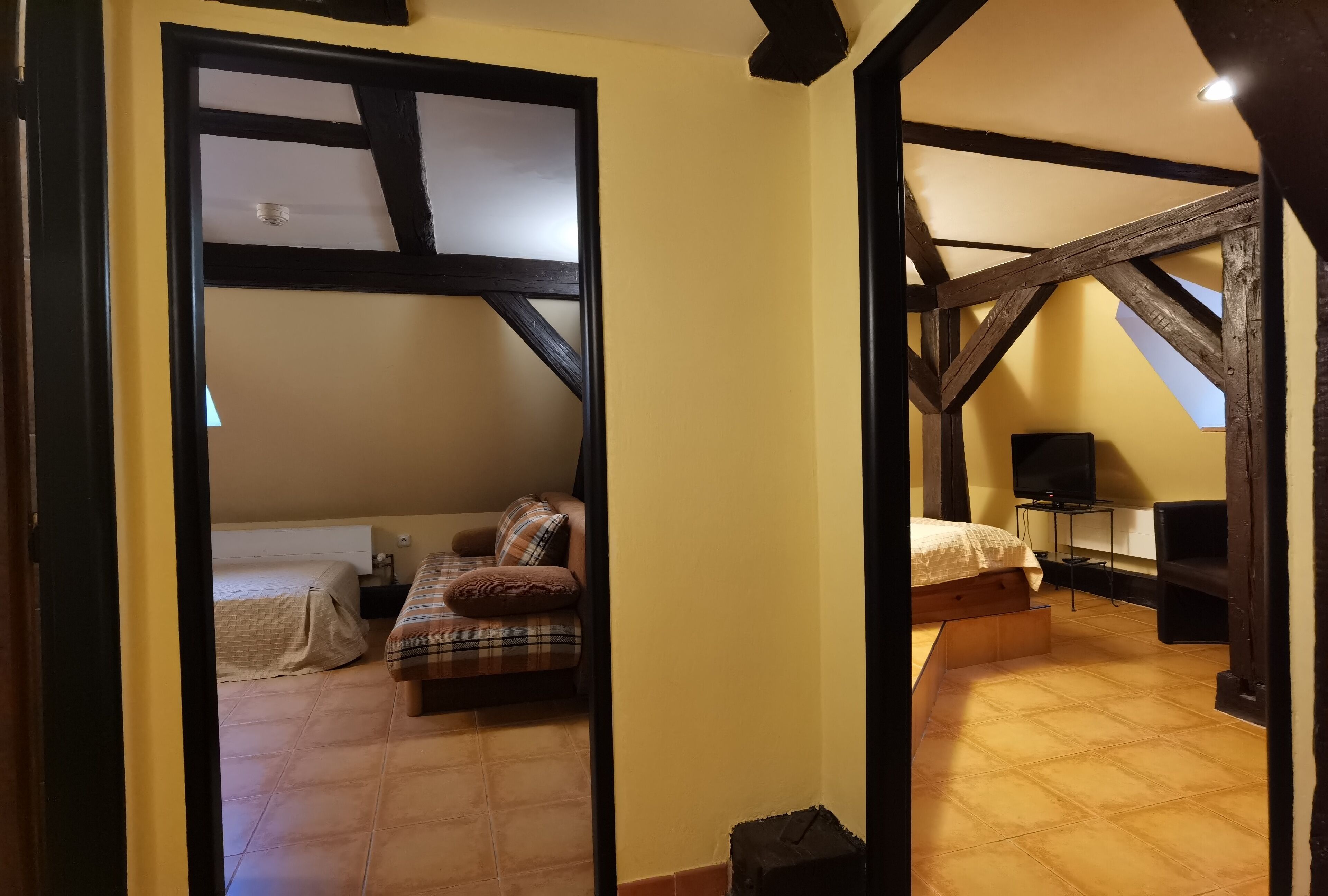 family room (attic) | 1 bedroom, in-room safe, soundproofing, iron/ironing board