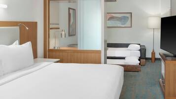 Desk, blackout drapes, iron/ironing board, free cribs/infant beds