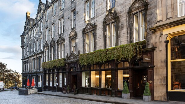 A historic building with a stone facade, large windows, and a sign for 'Fraser Suites'. - Fraser Suites Edinburgh (Edinburgh)