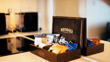 A box of Brodie's coffee with various coffee pods visible.