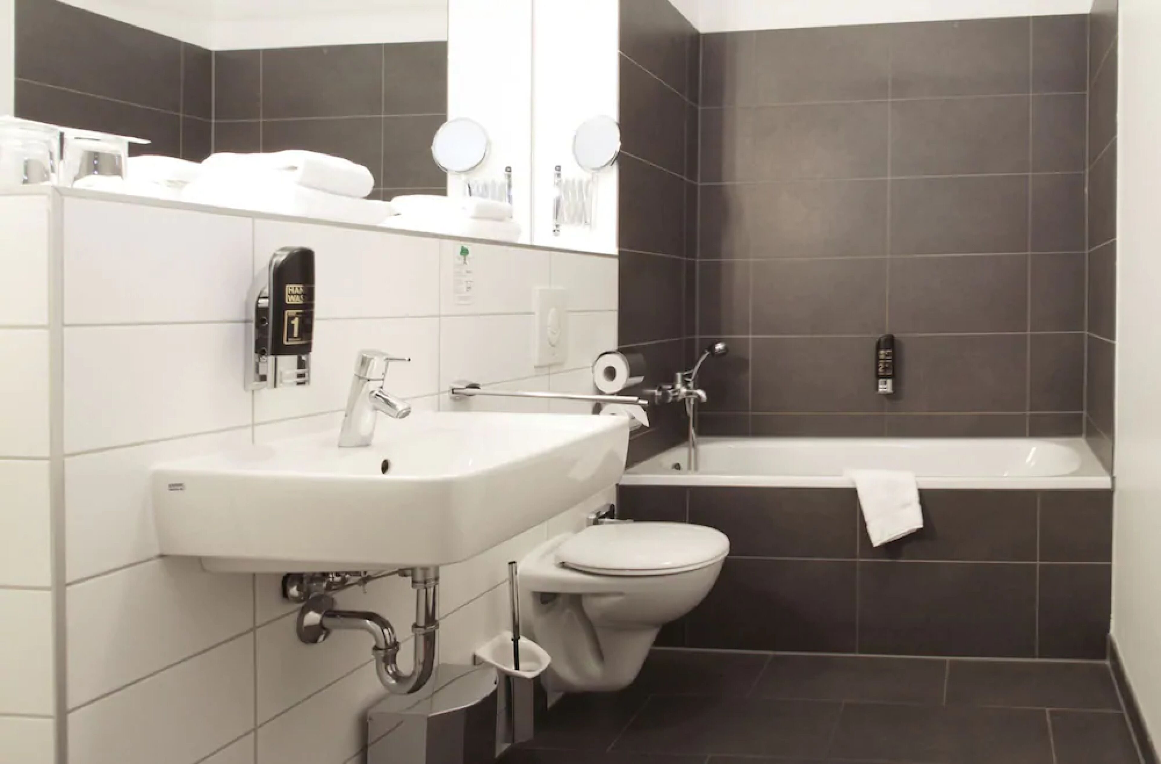 Shower, eco-friendly toiletries, hair dryer, towels