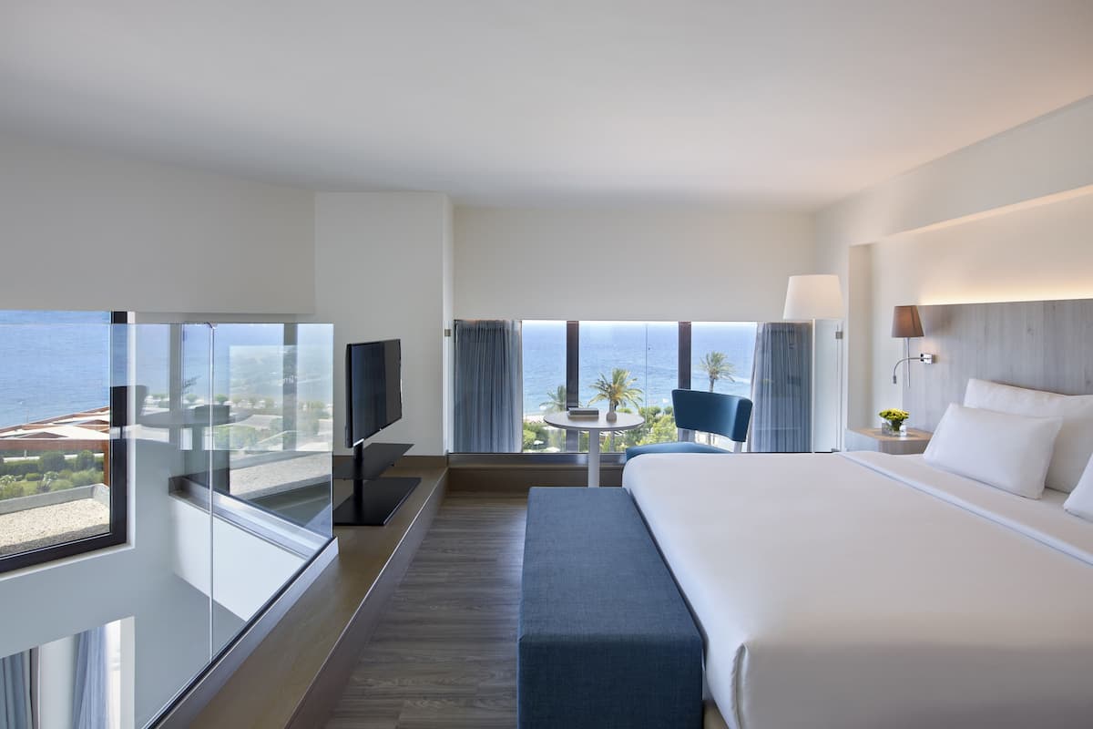 rodian suite, sea view | 1 bedroom, in-room safe, desk, blackout curtains