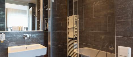 City Studio | Bathroom | Separate tub and shower, deep soaking tub, rainfall showerhead