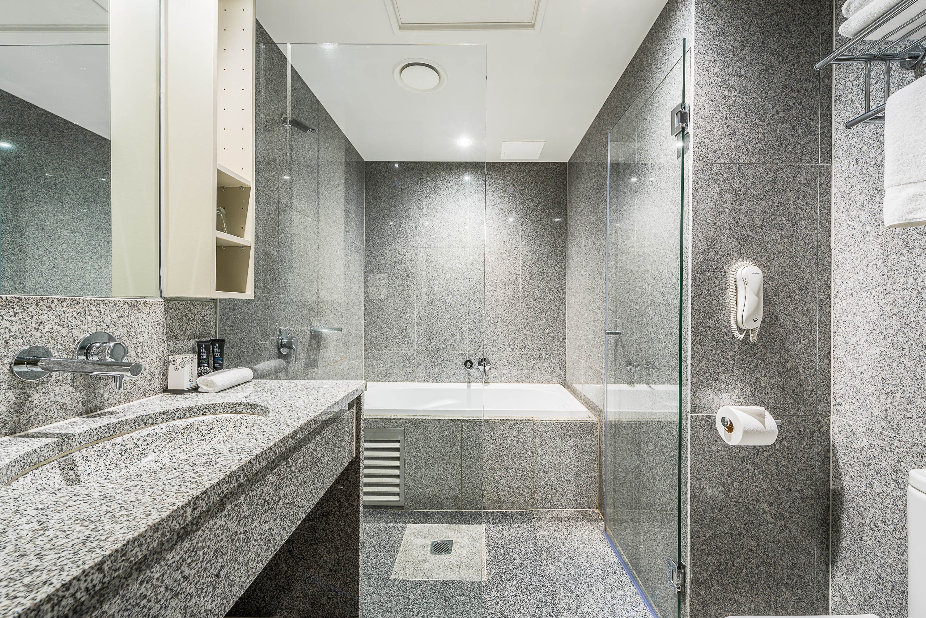 shower, free toiletries, hair dryer, towels