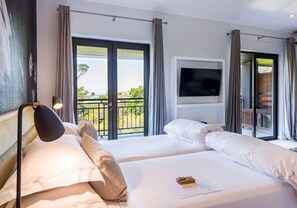 Superior kamer | Luxe beddengoed, een minibar, een kluis op de kamer