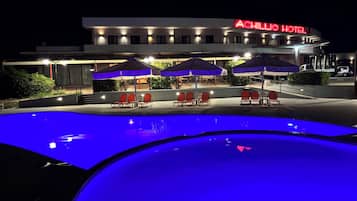 Seasonal outdoor pool, pool umbrellas, pool loungers