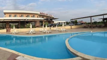 Outdoor pool, pool umbrellas, pool loungers
