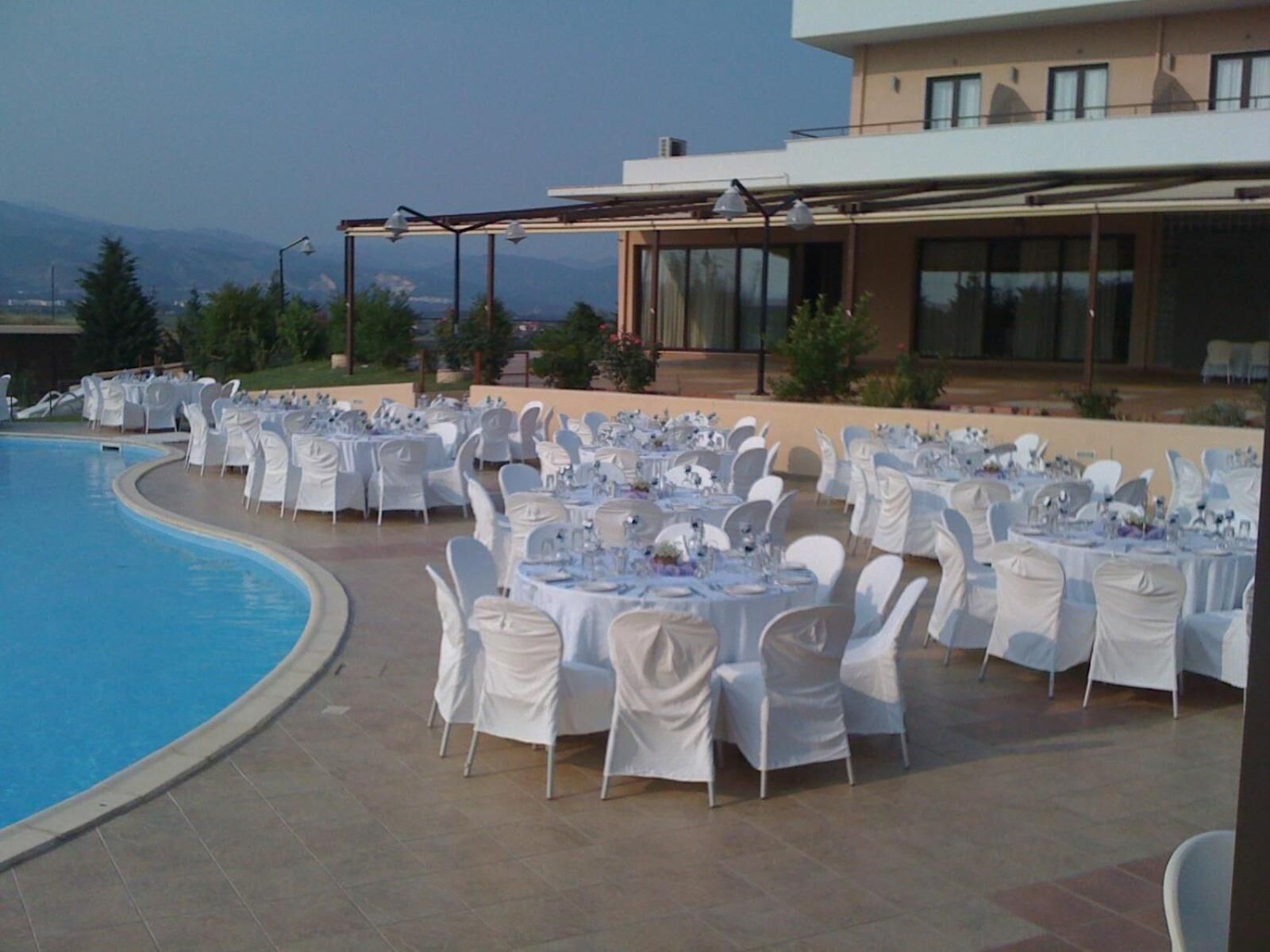 outdoor pool, pool umbrellas, pool loungers