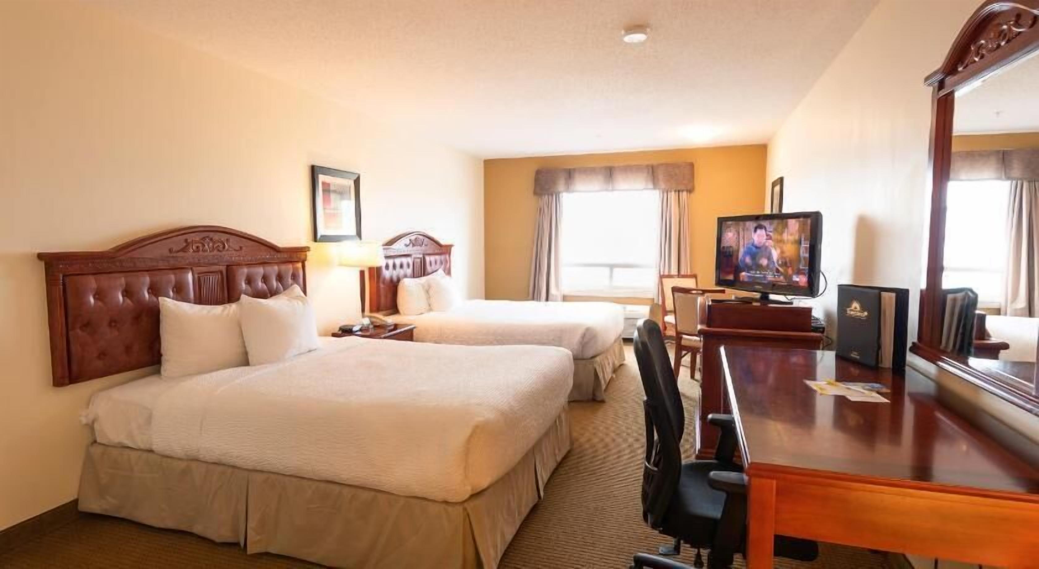 Pillow-top beds, desk, iron/ironing board, rollaway beds