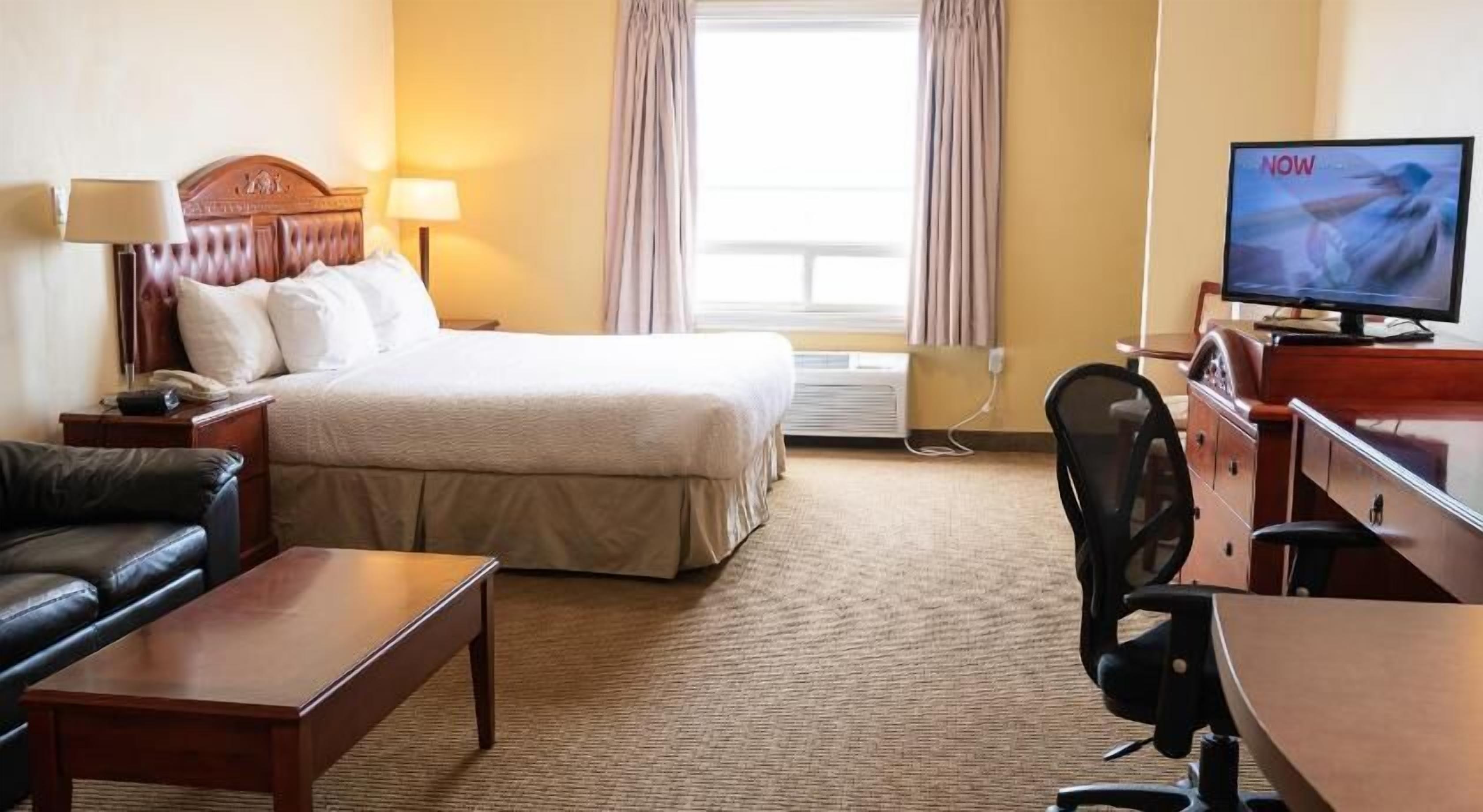 Pillow-top beds, desk, iron/ironing board, rollaway beds